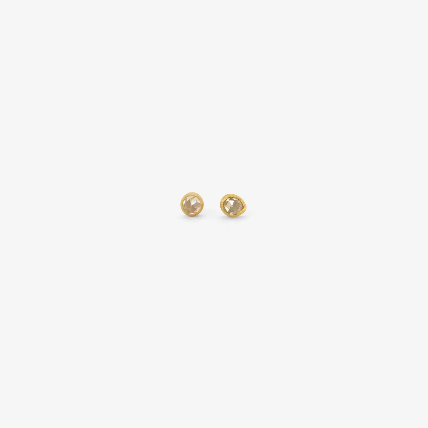 18k & asymmetrical antique rose-cut diamond studs, .65ct