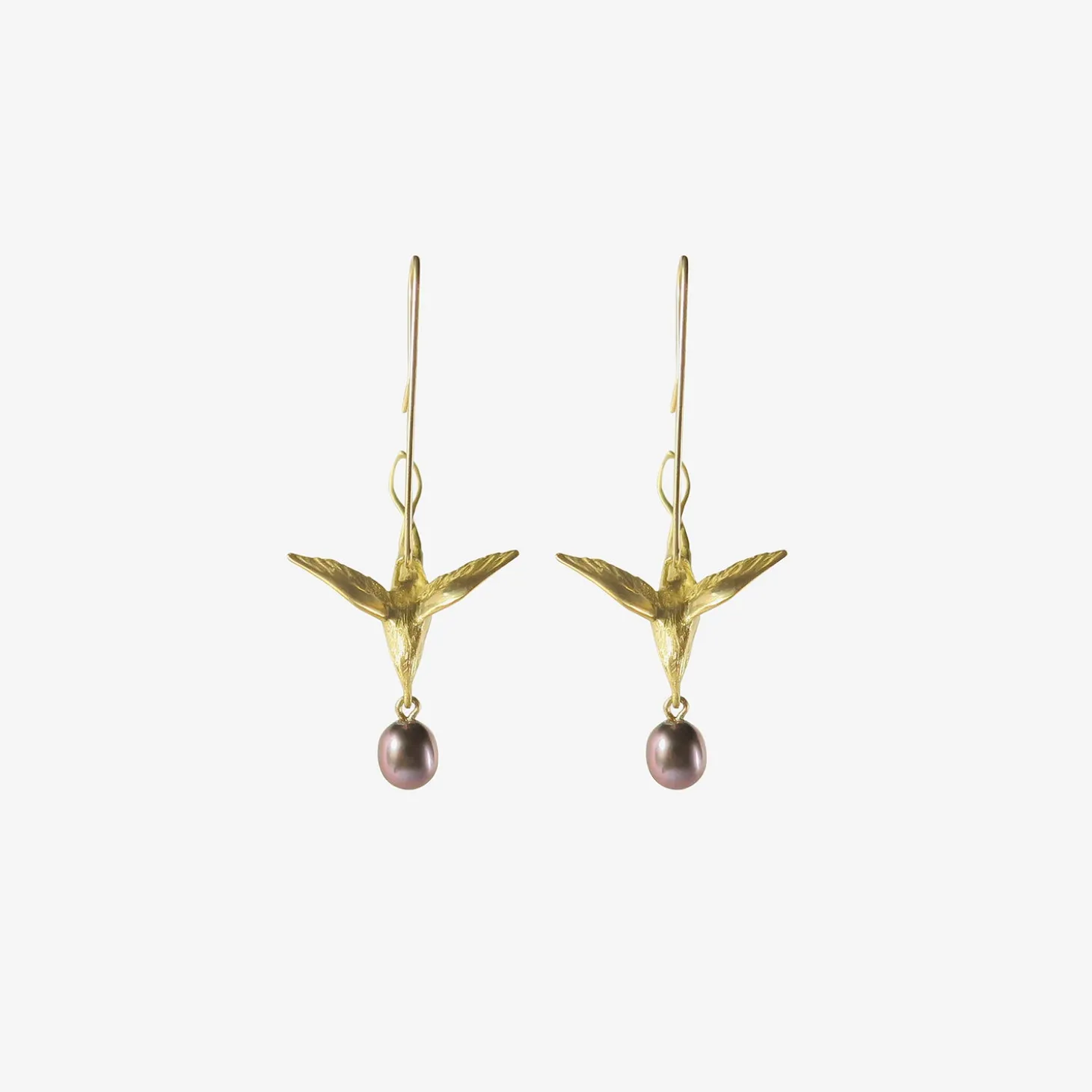 18k & black pearl flying bird earrings