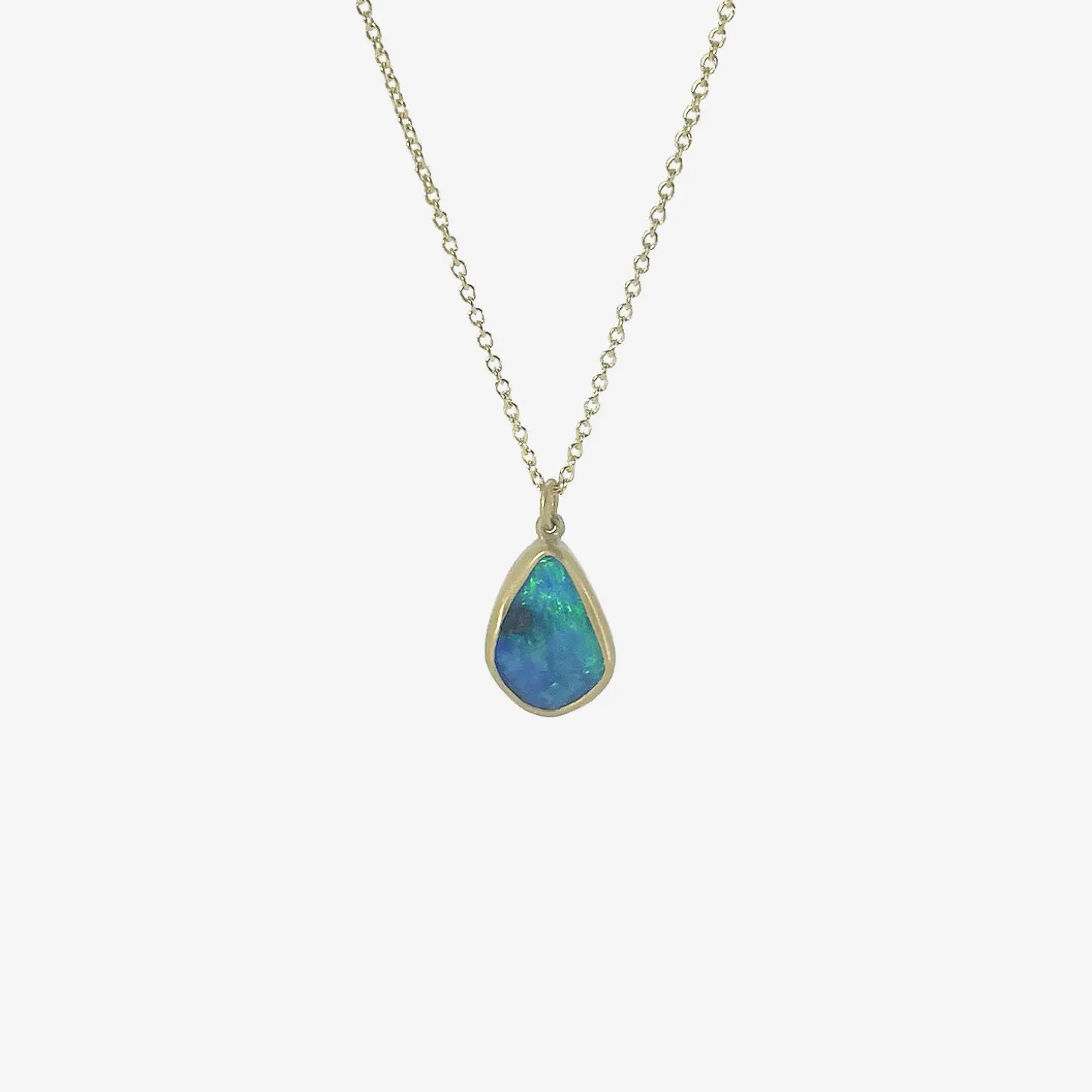 22k & brilliant blue green boulder opal pendant