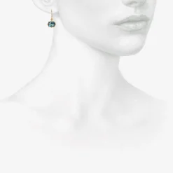 18k & faceted oval london blue topaz east/west mini gem earrings