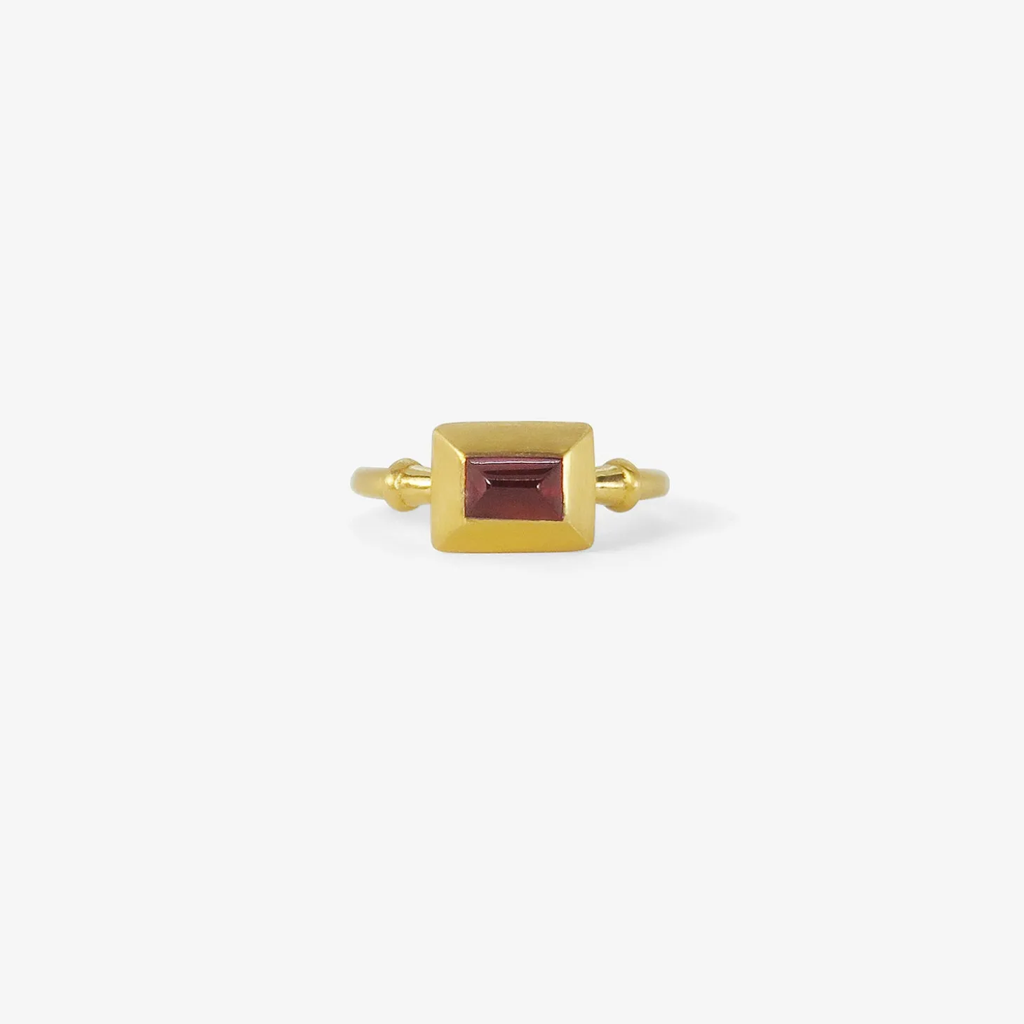 22k & garnet capsa ring