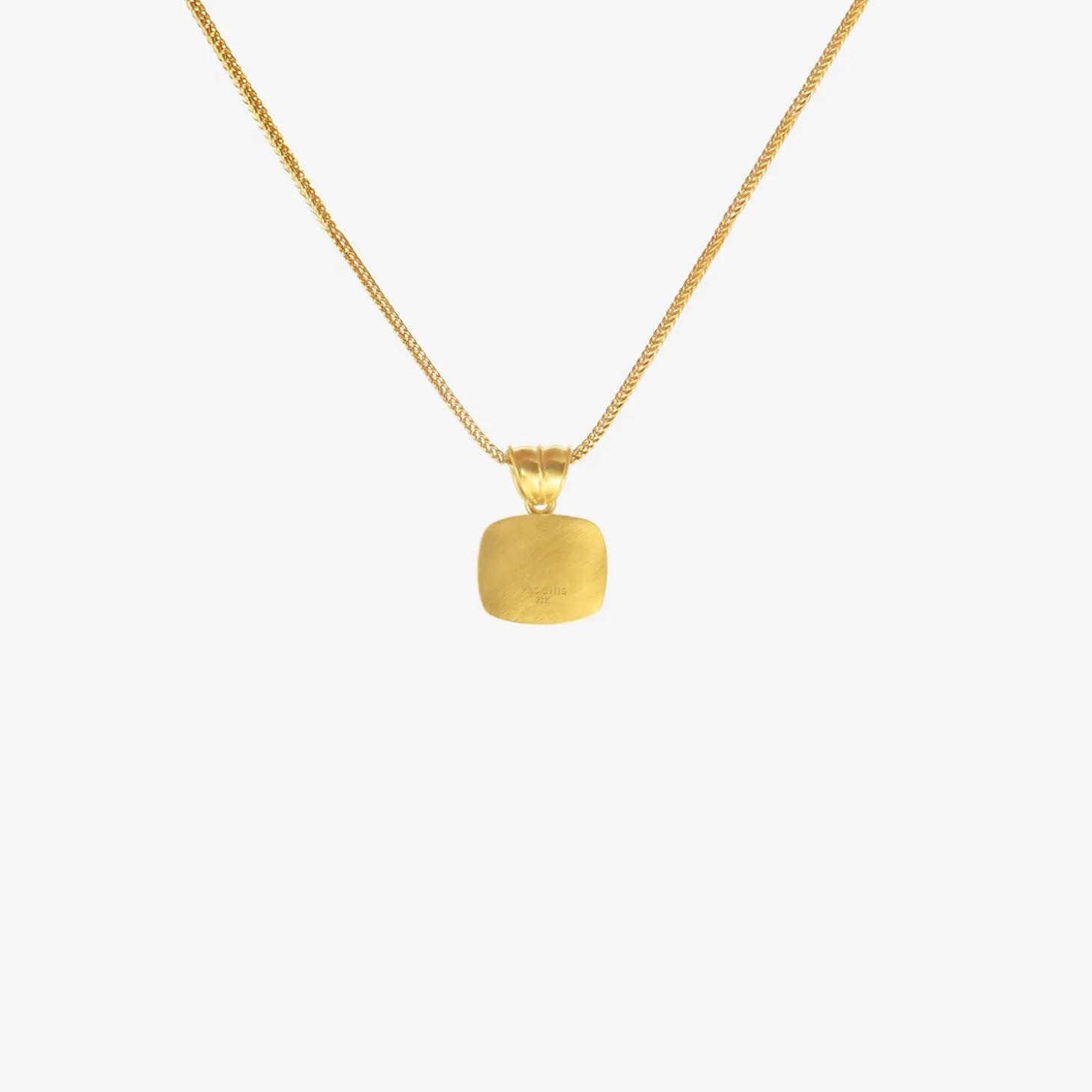 22k & medium cushion-shaped tanzanite pendant