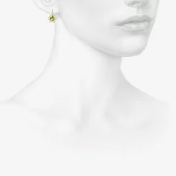 18k & platinum lacy flower earrings with round peridot
