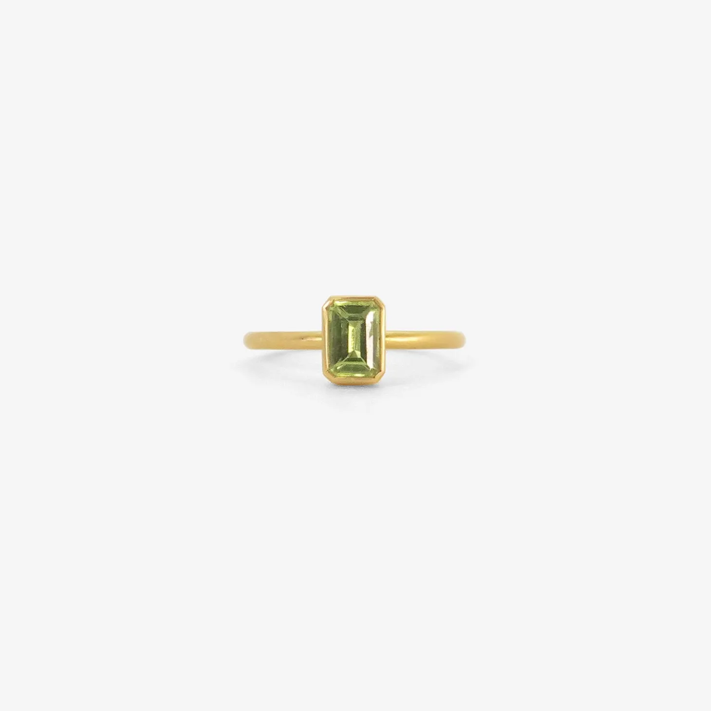 18k & small emerald-cut peridot ring