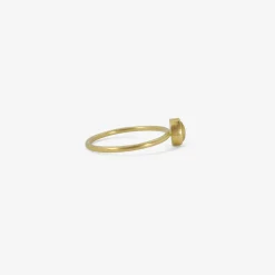 18k & tiny pear-shaped yellow sapphire ring
