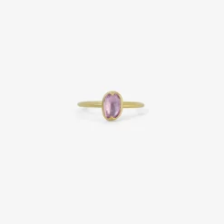 18k & wonky pink sapphire ring with two scallops, .74ct