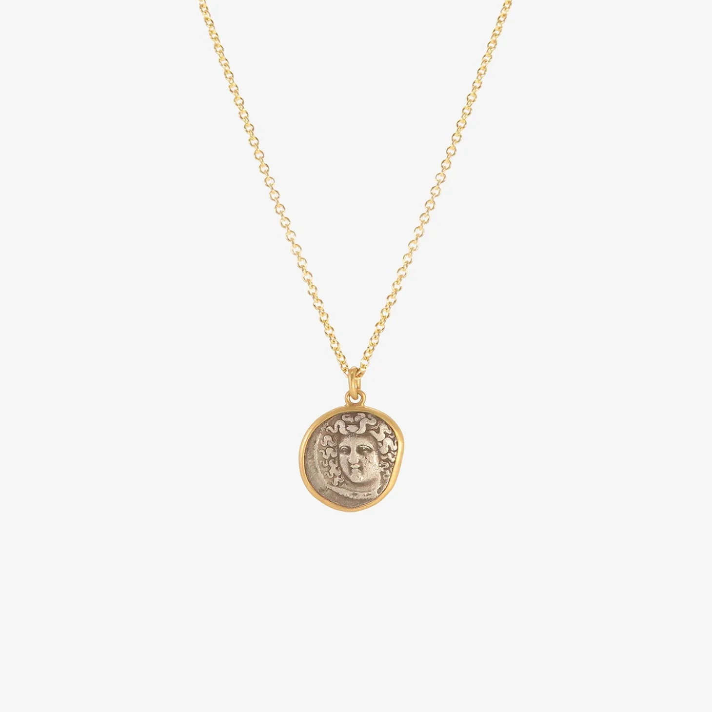 22k grazing horse/head of nymph larissa ancient coin pendant, 356-320 bc