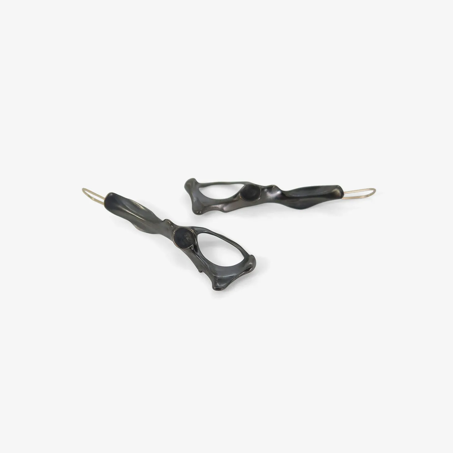 oxidized bronze pelvis earrings